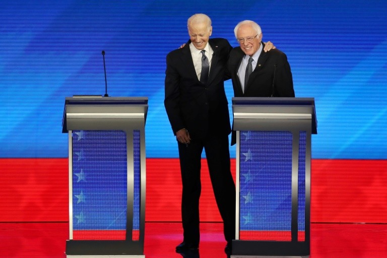 Left to right, presidential hopefuls Pete Buttigieg, Elizabeth Warren, Joe Biden and Bernie Sanders at the eighth Democratic primary debate of the 2020 campaign season in Manchester, New Hampshire