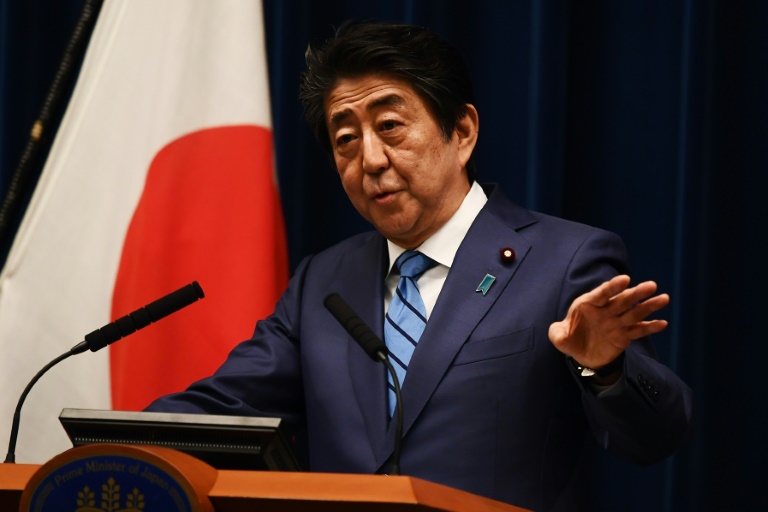Abe Japan's Abe Pledges Olympics To Go Ahead Despite Virus