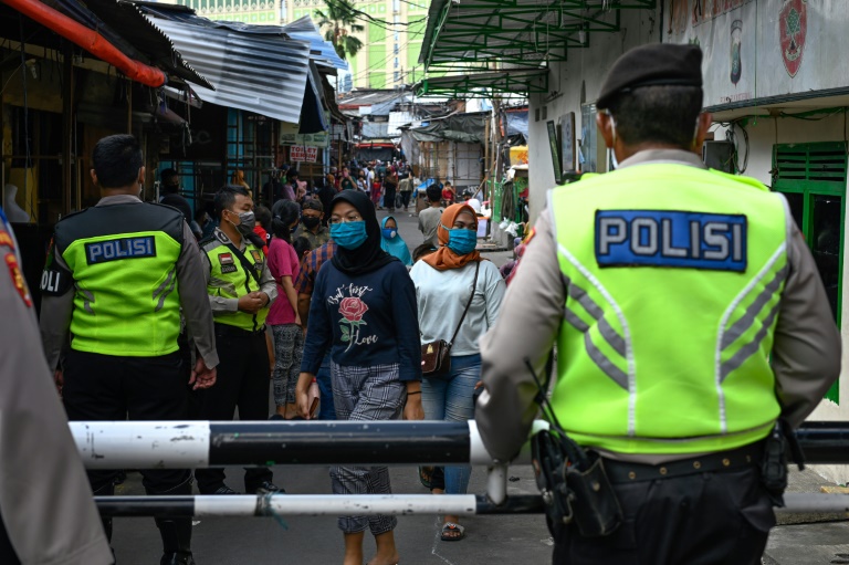 Indonesia rolls out public shaming for virus violators