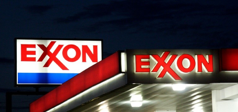 US Oil Giants Cut Output As Exxon Mobil Reports 1st Loss