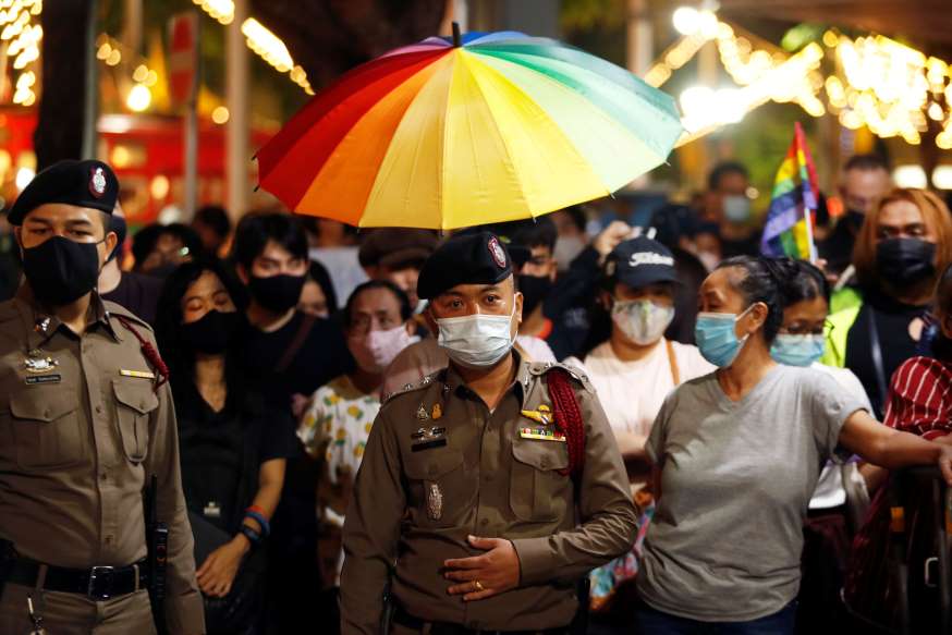 Thai LGBT activists raise pride flag in anti-government rally