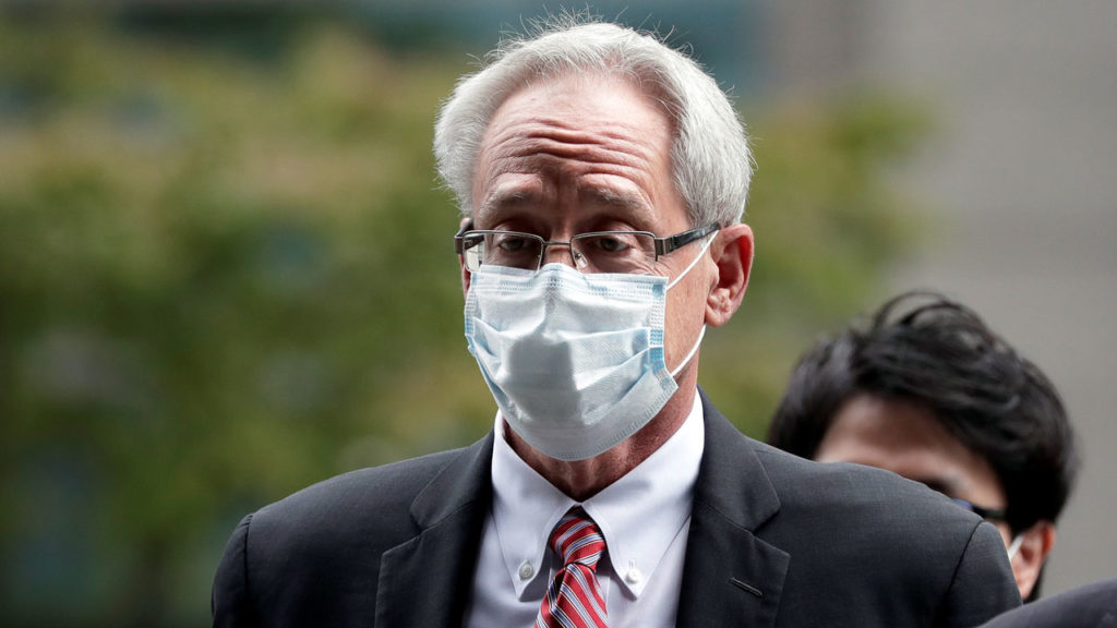 Former Ghosn aide Greg Kelly pleads not guilty as trial opens