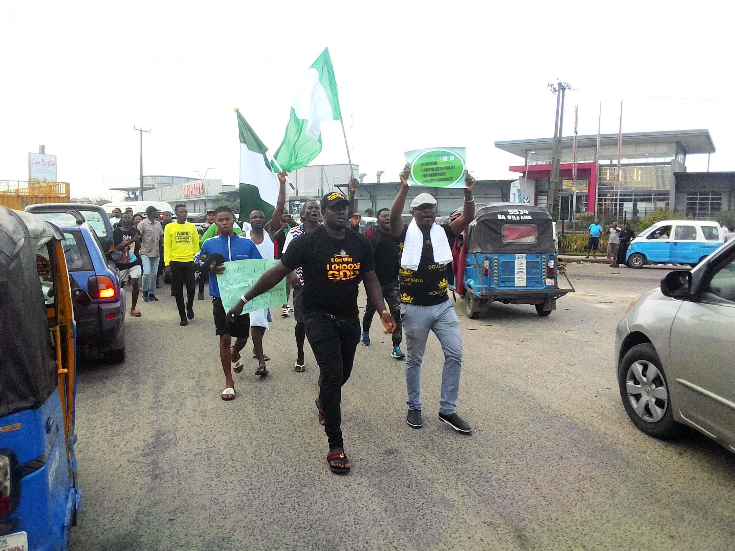 Travellers groan as End SARS protesters block Delta road