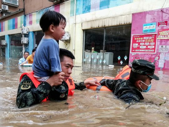 21 Dead As Torrential Rainfall Batters Central China