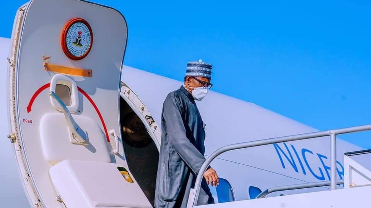 President Buhari Arrives Paris For Peace Forum