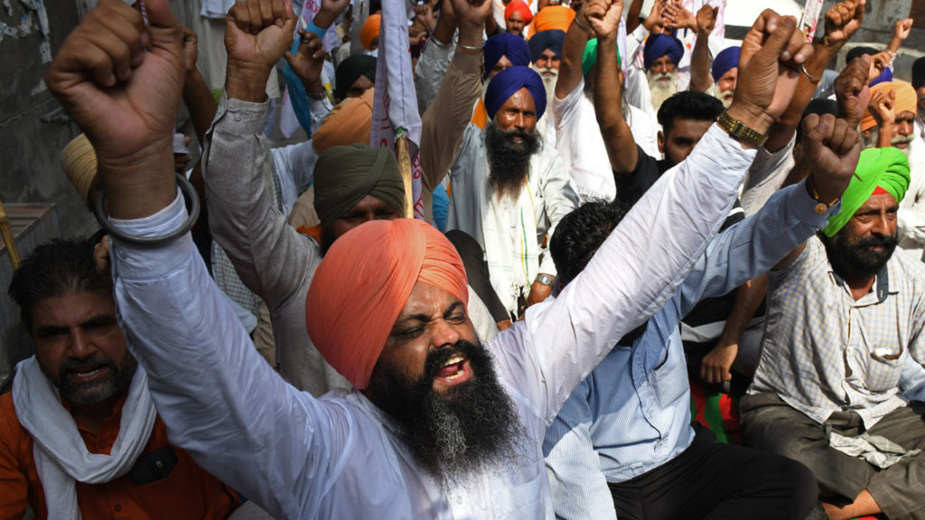 Indian Farmers End Mass Protests Against Modi's Reforms