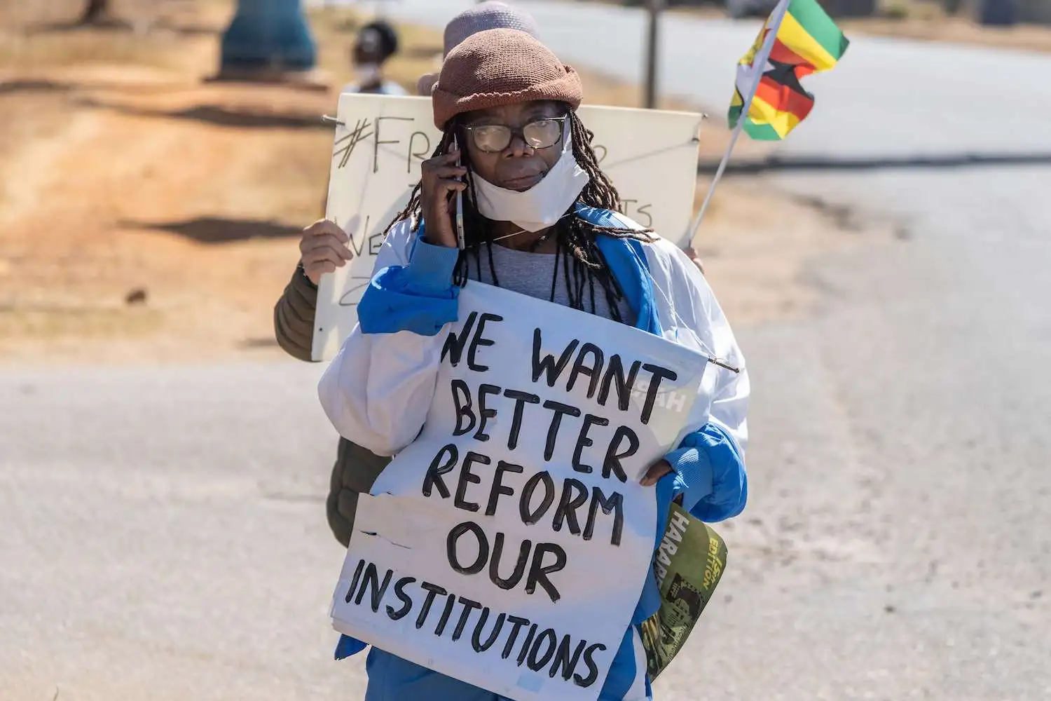 Outrage As Top Zimbabwe Author Is Jailed Over Placard Protest