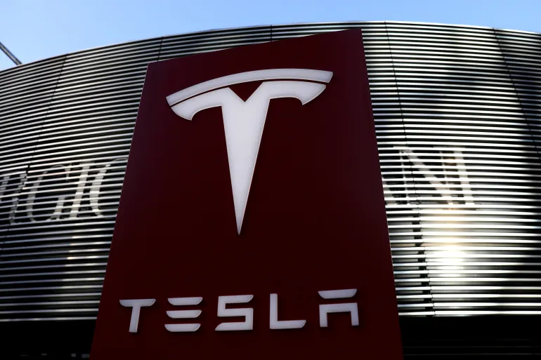 Cheaper Vehicles Tesla Profit Plunges 55%, As Shares Bounce