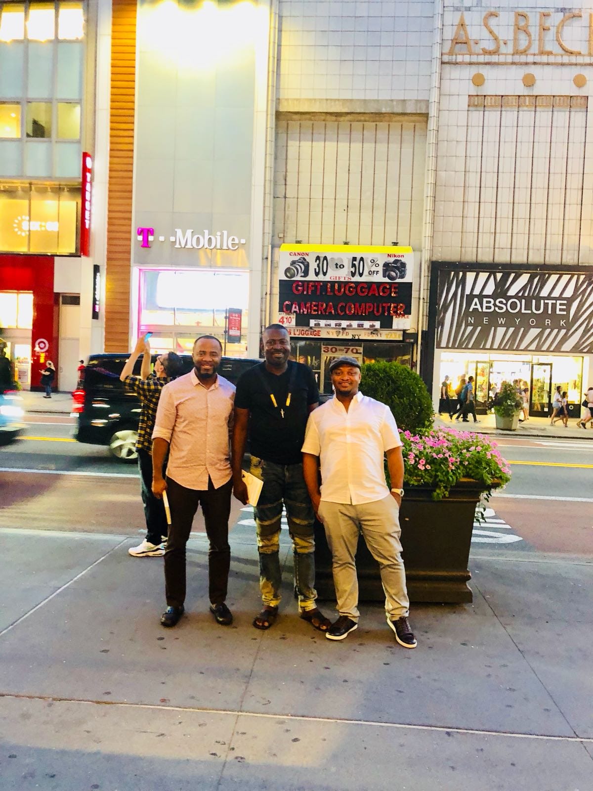 L-R: Melvin, Shamma and Nze.Photograph taken in Manhattan, New York, 2018, featuring both gentlemen holding copies of Prof. MarkAnthony Nze autographed books.