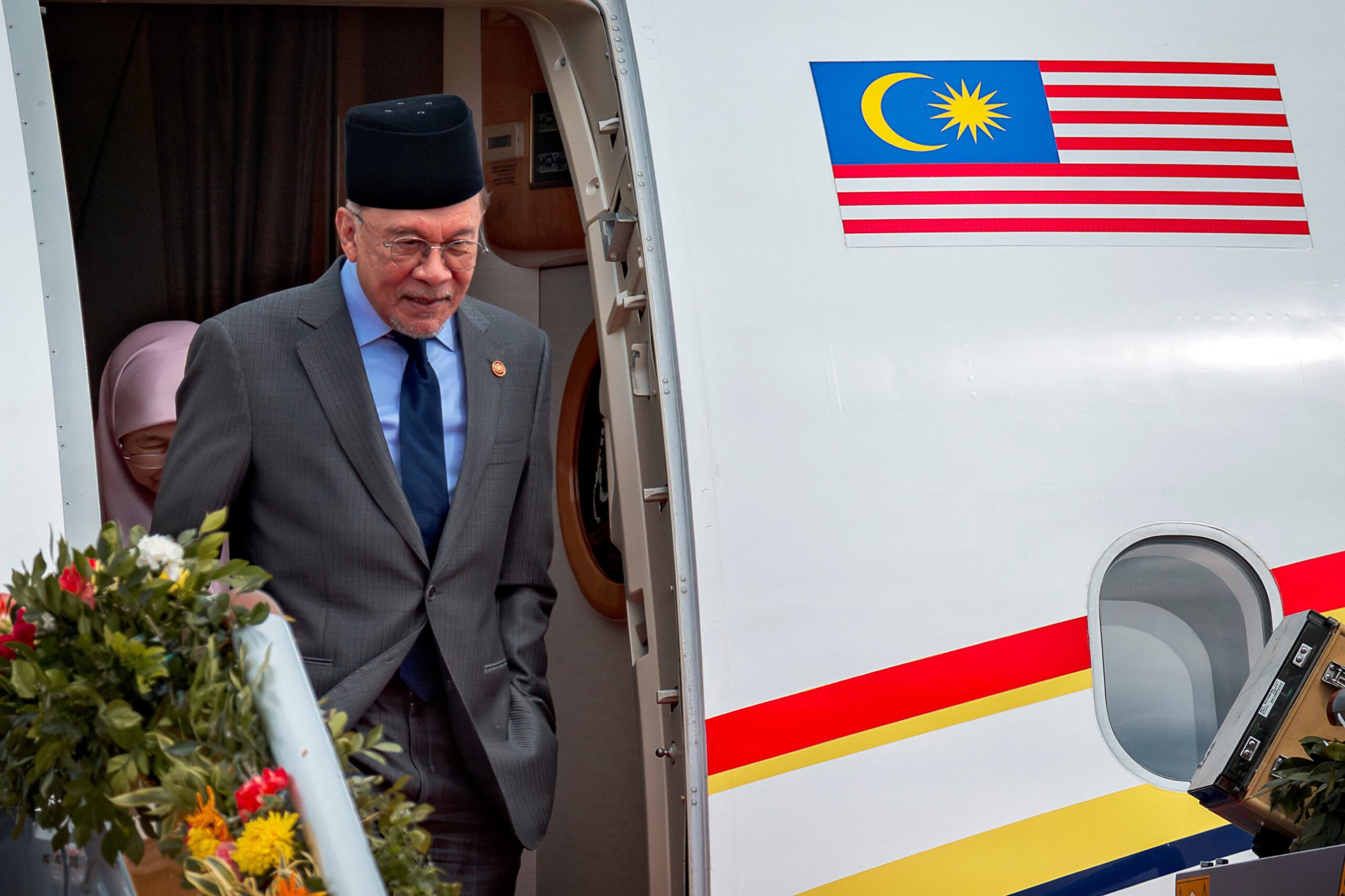 Anwar Faces Major Support Test As Two States Hold Early Polls